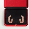 Kruhové náušnice Clash De Cartier, malý model, s pavé