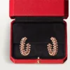 Kruhové náušnice Clash De Cartier – růžové zlato, malé | Cartier Us