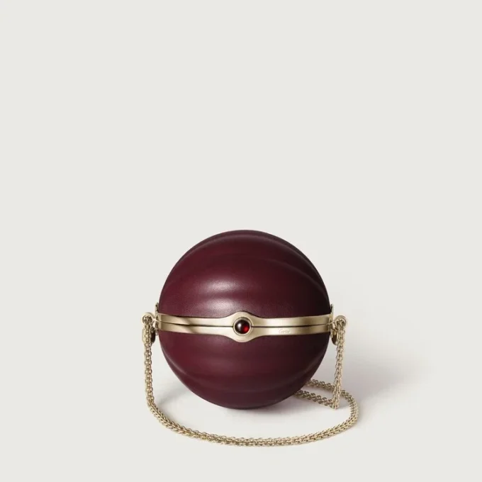 Kulatá taška s gadroonovým motivem, Cartier Soir