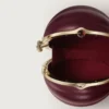 Kulatá taška s gadroonovým motivem, Cartier Soir
