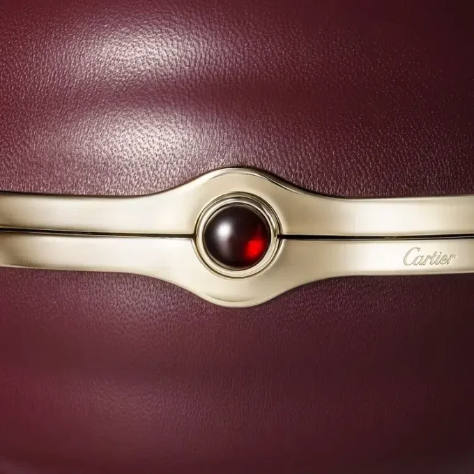 Kulatá taška s gadroonovým motivem, Cartier Soir