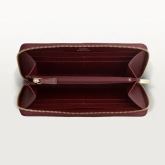 Mezinárodní peněženka na zip, Must De Cartier – vínová telecí kůže, zlaté provedení – Cartier