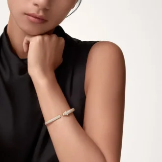 Náramek Panthere De Cartier, malý model, částečně osázený