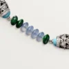 Šperkový náhrdelník – bílé zlato, chalcedon, skarn, tyrkys, černý lak, diamanty – Cartier