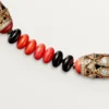 Šperkový náhrdelník – růžové zlato, korál, onyx, černý lak, diamanty – Cartier